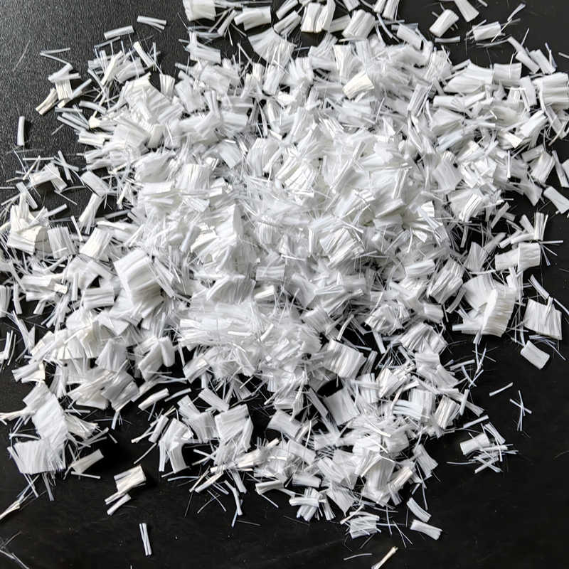 Fibra para fabrico de papel com baixo encolhimento Fibras de poliéster